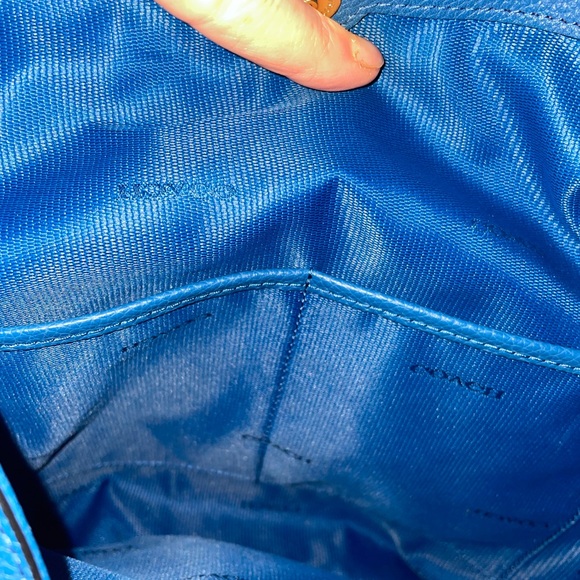 The Coach Edie bag soft slouchy silhouette style with functional design. - Picture 8 of 13